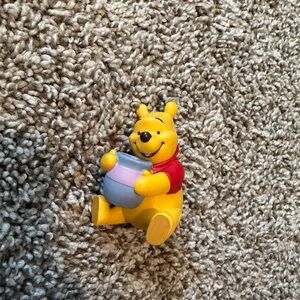 Winnie the Pooh Yellow Figure Toy with Red Shirt and Gray Honey Pot